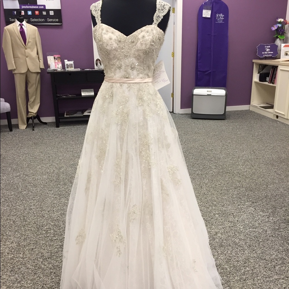 Wedding Dress it’s a beautiful blush color